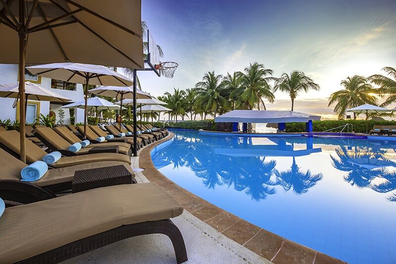 Desire Pearl Riviera Maya clothing-optional conceptual pool with loungers in Puerto Morelos