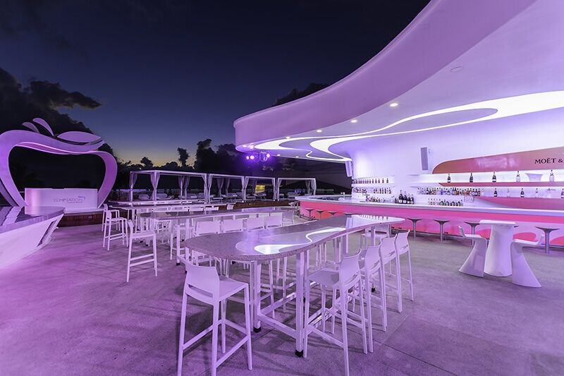 Temptation Cancun Bash bar at night, the main bar where the resort hosts its nightly theme parties