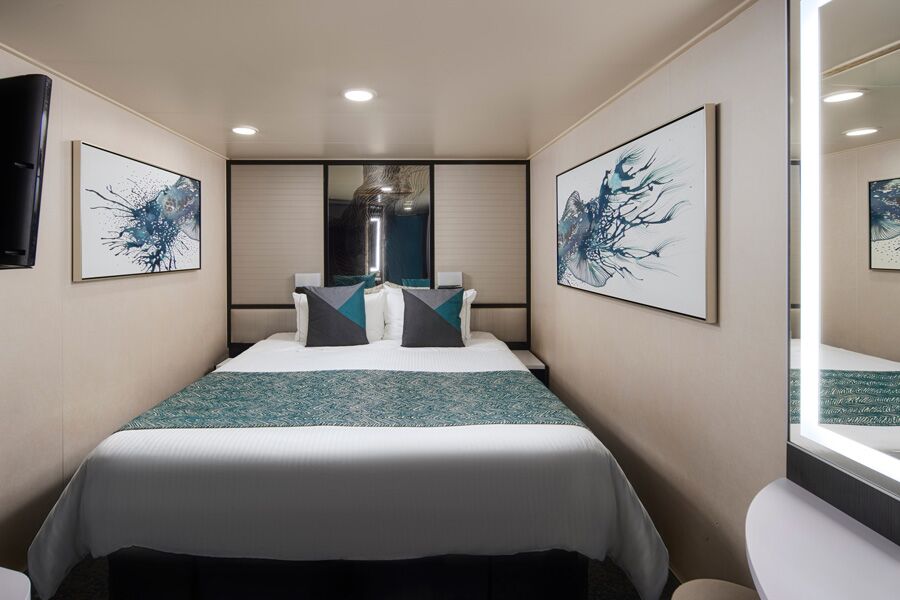 Interior stateroom on Norwegian Jewel, the lowest-priced cabin category on the Temptation Caribbean Cruise